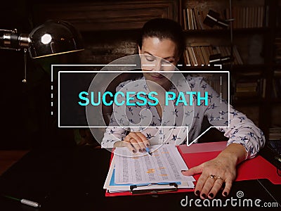 SUCCESS PATH text in footnote block. Marketing expert checking financial report SuccessÂ could be a favorable outcome, a result, Stock Photo